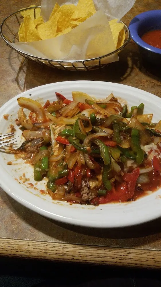 2 Beef Burritos Covered with Grilled Onions and Peppers